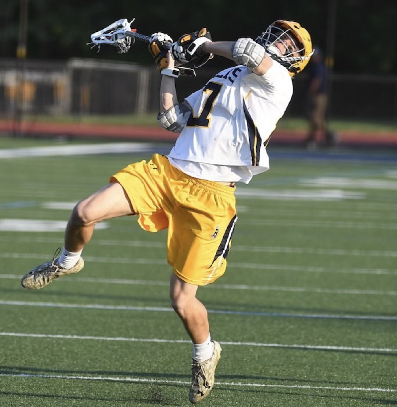 Bryson playing lacrosse at Bullis